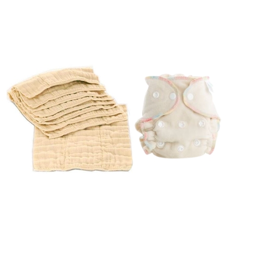 a stack of prefold cotton diapers next to a fitted cotton fleece diaper