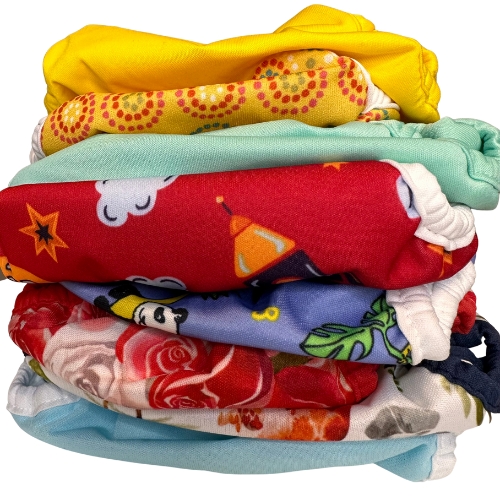 8 cloth diaper covers stacked